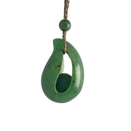 Jade Pendant with jade bead inside, 1.25"